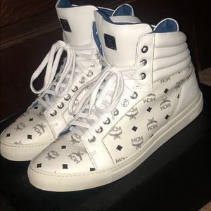 Selling my MCM high top all white sneakers.
